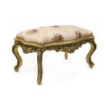 An 18th century style Italian carved giltwood framed stool,