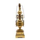 An early 20th century gilt metal table lamp,