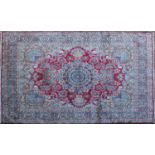 A hand knotted Kirman carpet