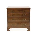 A George III style mahogany bachelors chest of drawers,