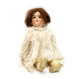 A Simon and Halbig bisque head doll,