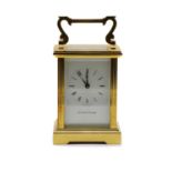 A Mappin & Webb brass cased carriage timepiece,
