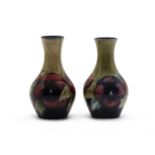 A pair of Moorcroft pottery ‘Pansy’ pattern vases,