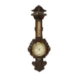 A Victorian oak aneroid barometer,