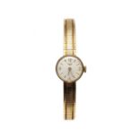 A ladies' 9ct gold Longines mechanical bracelet watch,