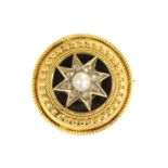 A Victorian gold pearl and diamond star brooch,