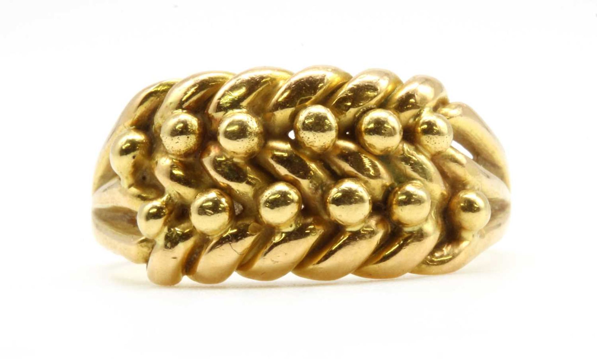 An 18ct gold keeper ring,