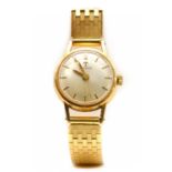 A ladies' gold Tissot mechanical bracelet watch,