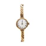 A ladies' 9ct gold pin set mechanical watch head,