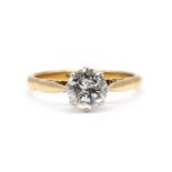 A gold single stone diamond ring,