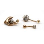 Three gold cubic zirconia set belly button bars,
