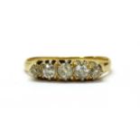 An 18ct gold five stone diamond ring,