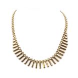 A 9ct gold 'Cleopatra' style fringe necklace,