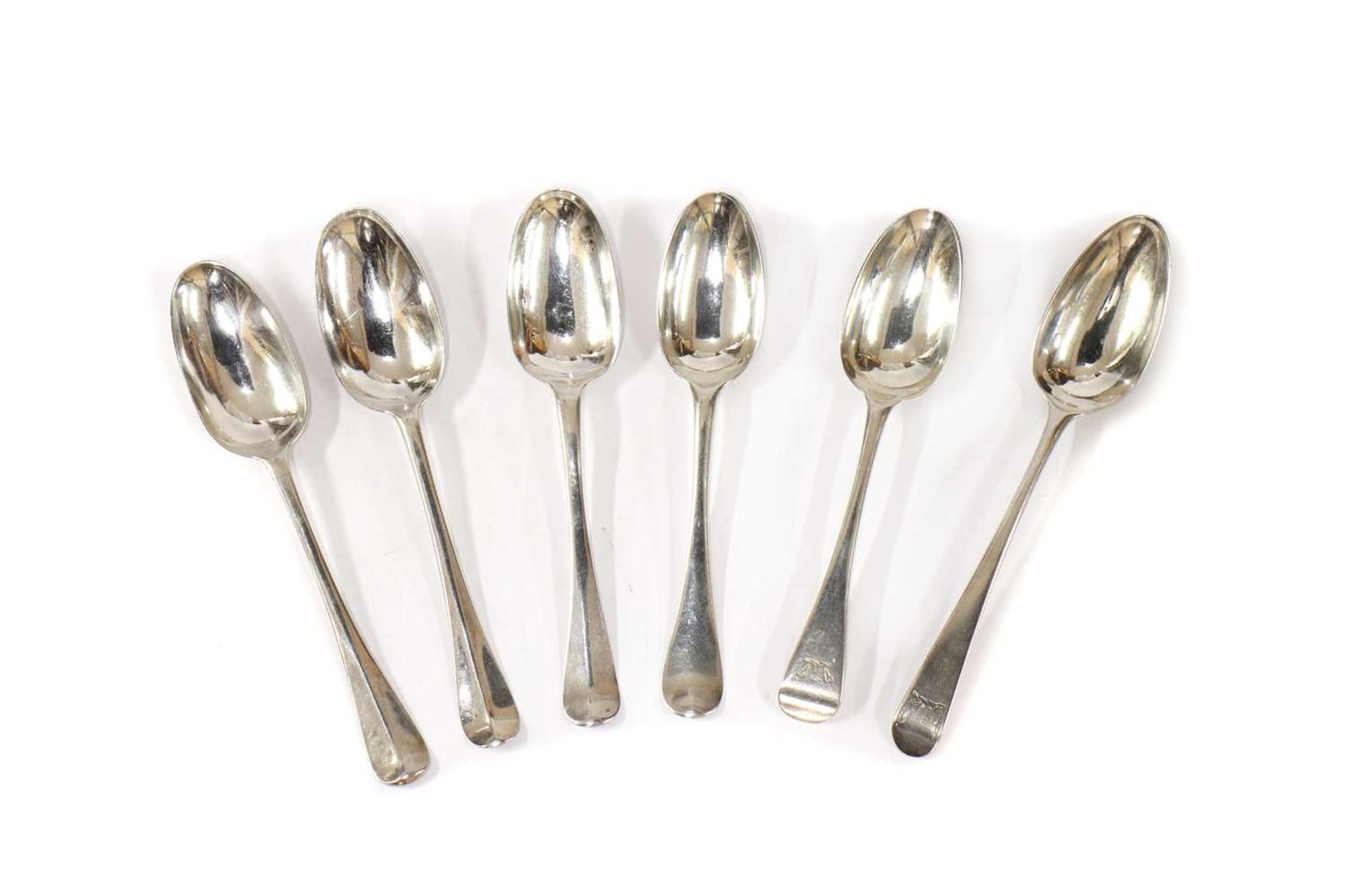 Four matched George II silver dessert spoons,
