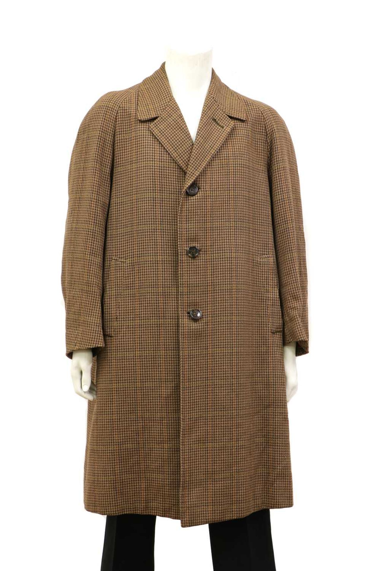 A brown tweed single-breasted overcoat,