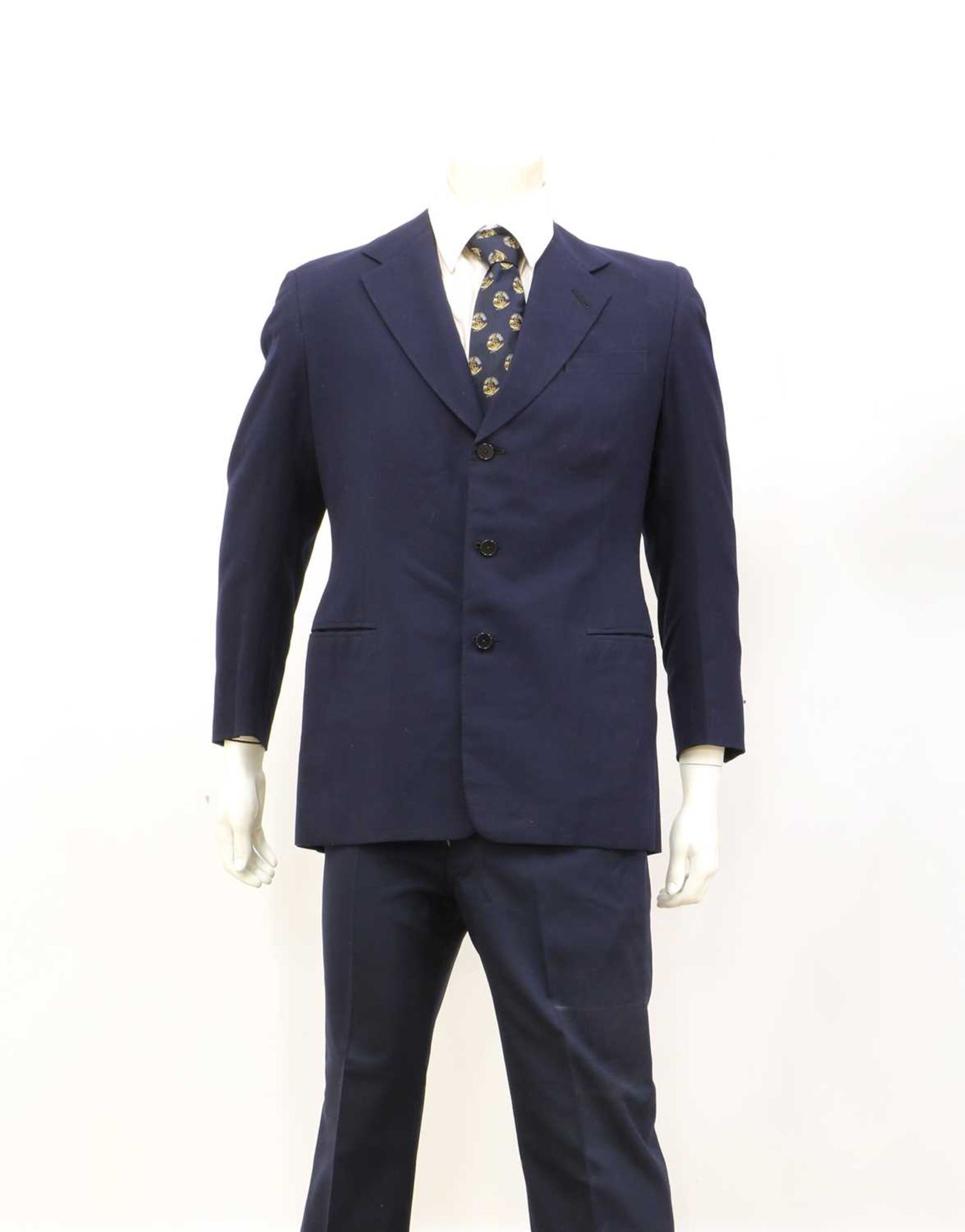 Four suits by Stovel & Mason Ltd.,