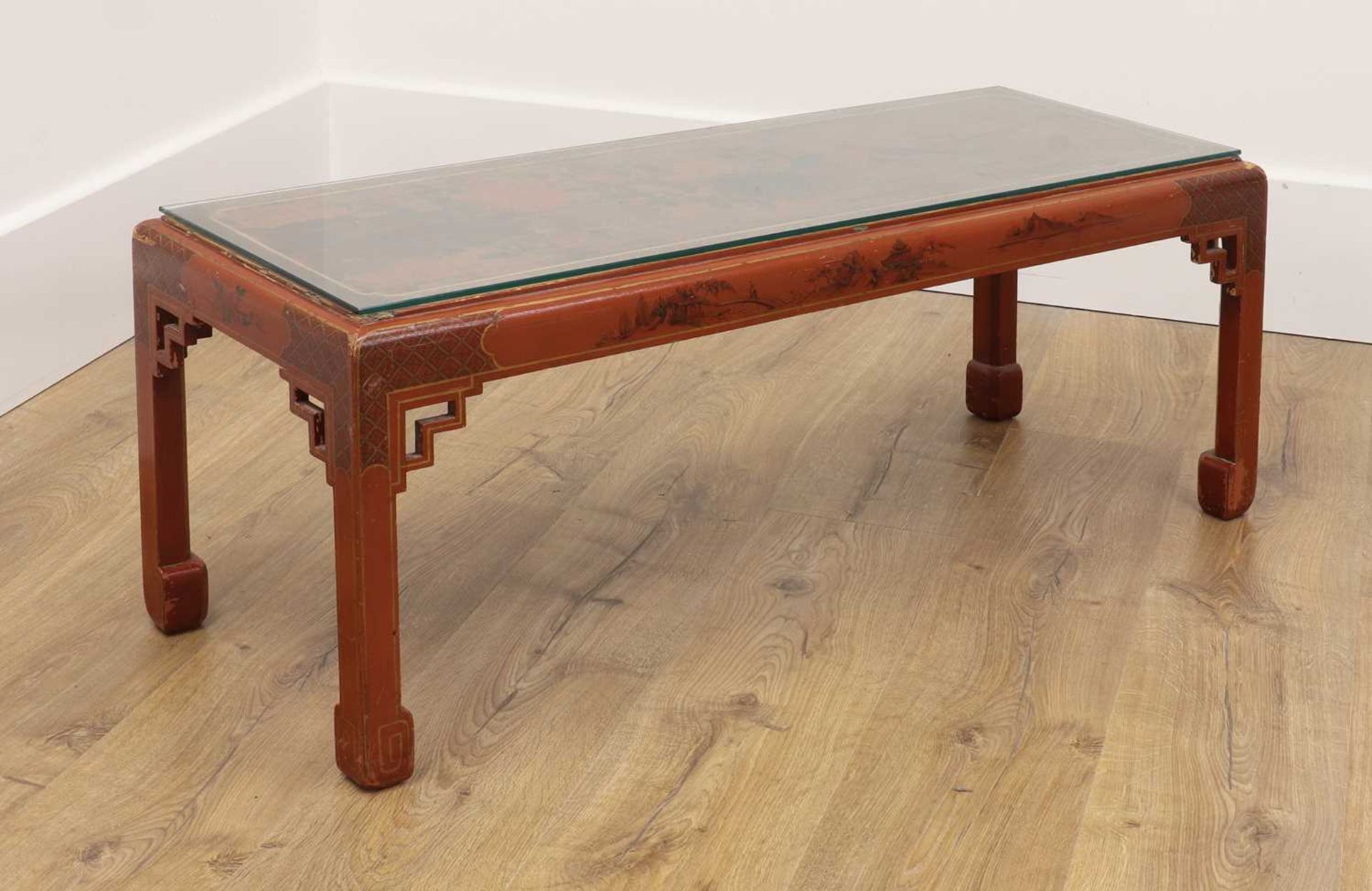 An 18th-century-style red lacquer low coffee table,