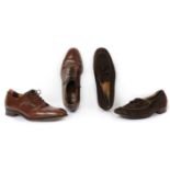 A pair of brown leather custom-made shoes,