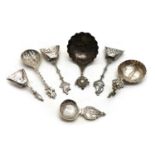 A collection of silver caddy spoons,