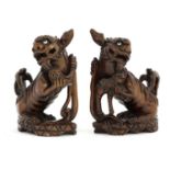 A pair of Chinese wood carvings,
