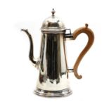 A silver coffee pot,