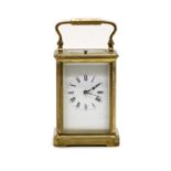 A brass repeater carriage clock,