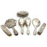 A collection of silver dressing table items