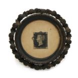 A Victorian Penny Black stamp,