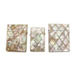 A near pair of Victorian mother of pearl veneered card cases,