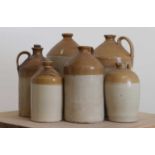 A group of six large stoneware flagons,