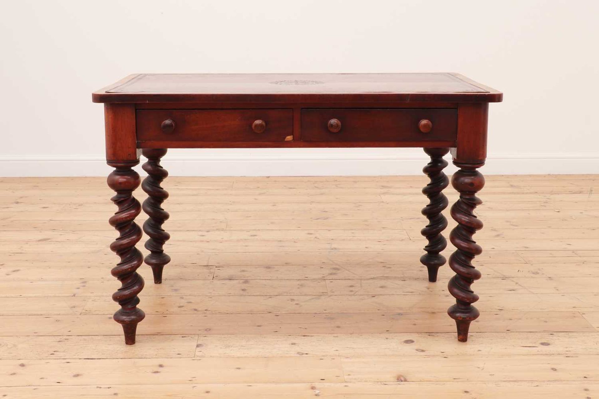 A Victorian walnut writing table,