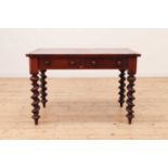 A Victorian walnut writing table,