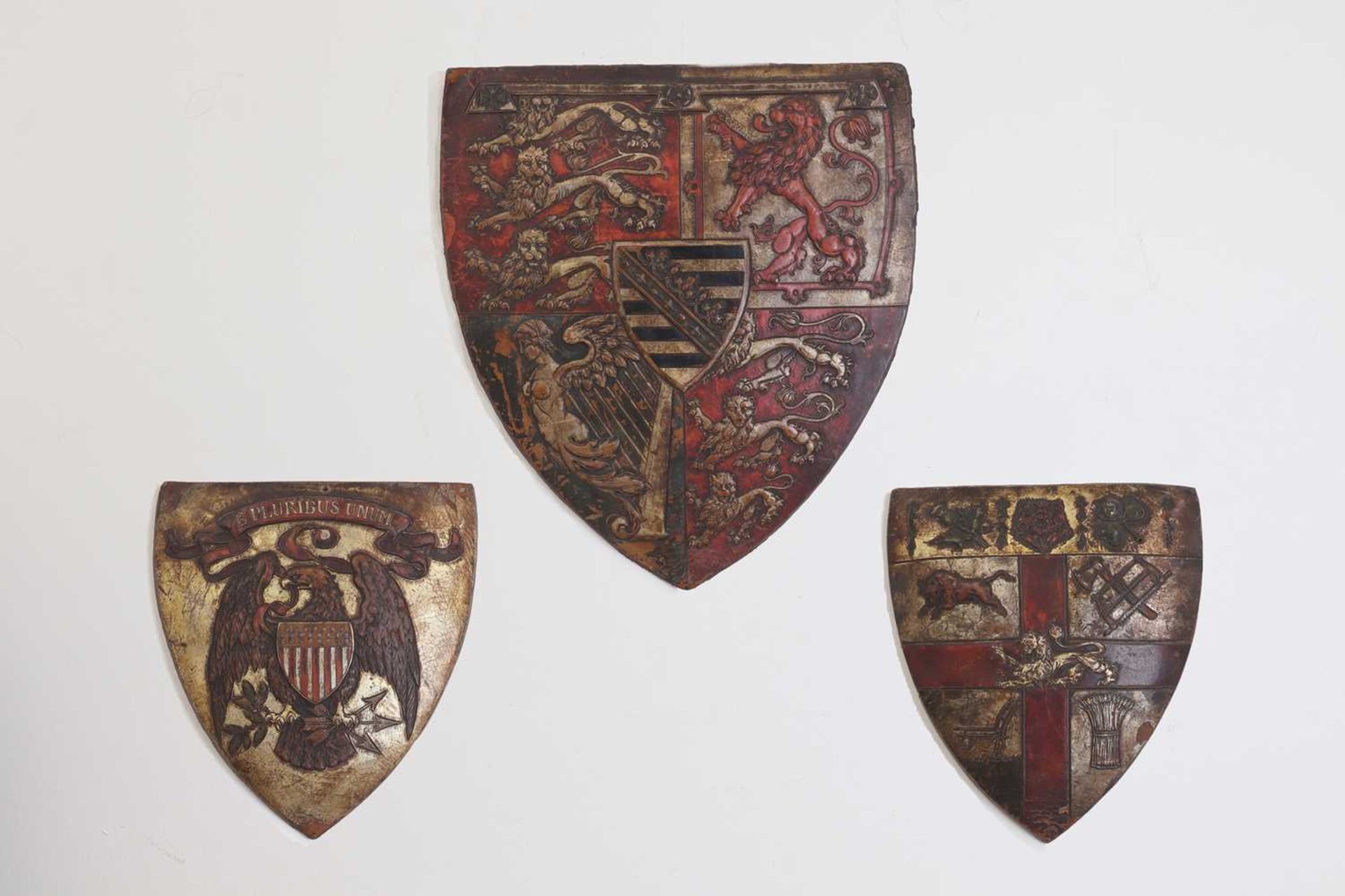 An embossed leather Royal Standard armorial shield,