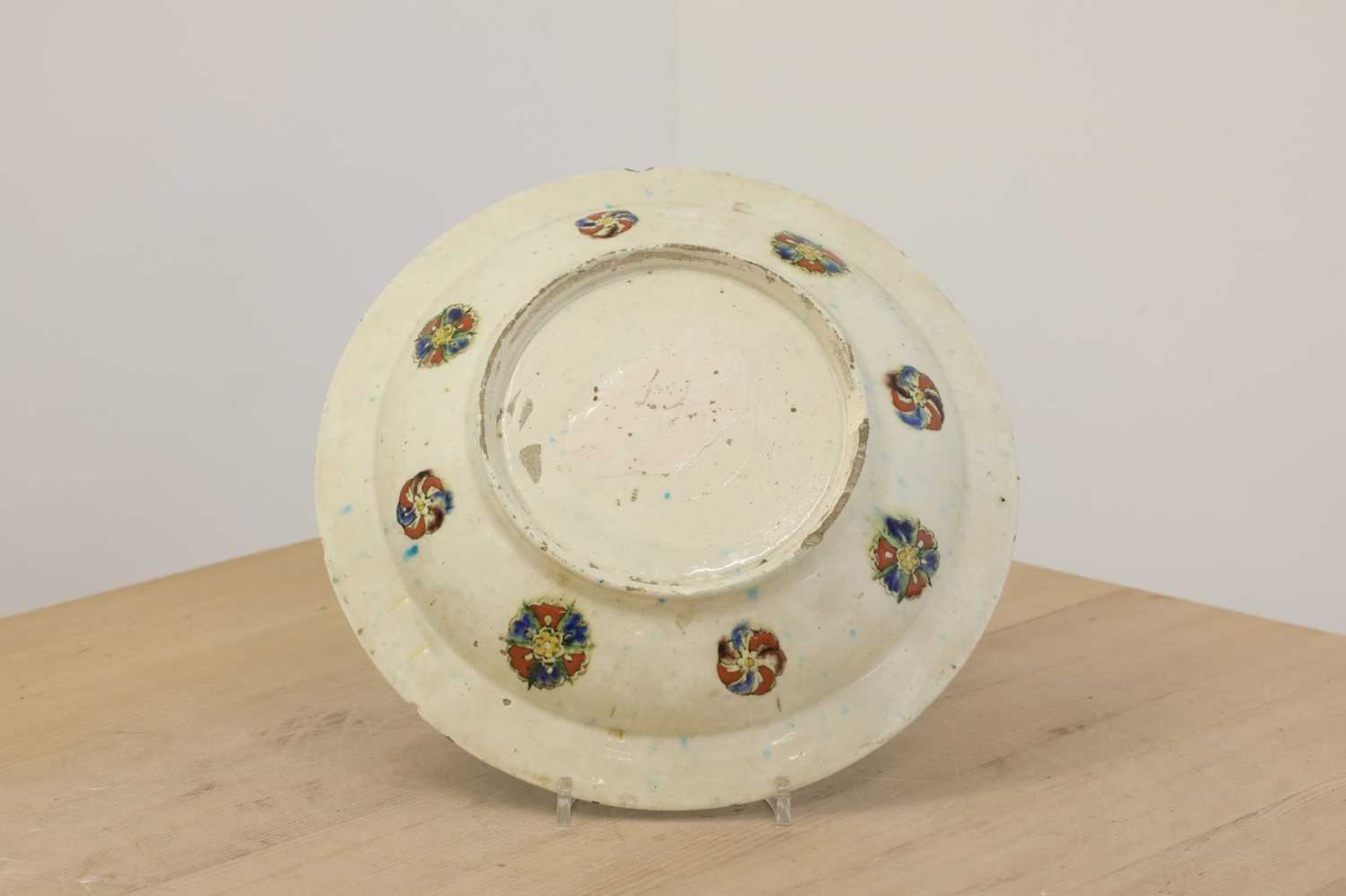 An Iznik pottery dish, - Image 2 of 2