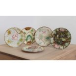 A group of five majolica plates,