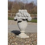 A large composite stone urn,