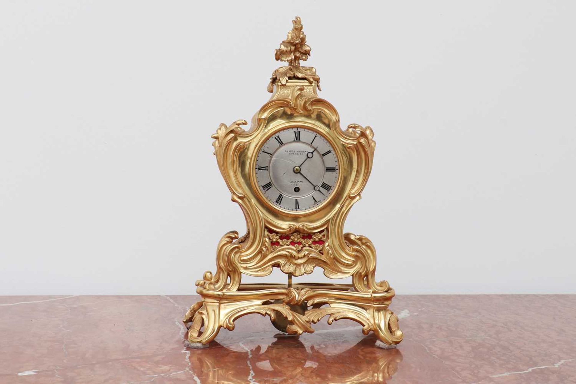 An ormolu-cased timepiece,