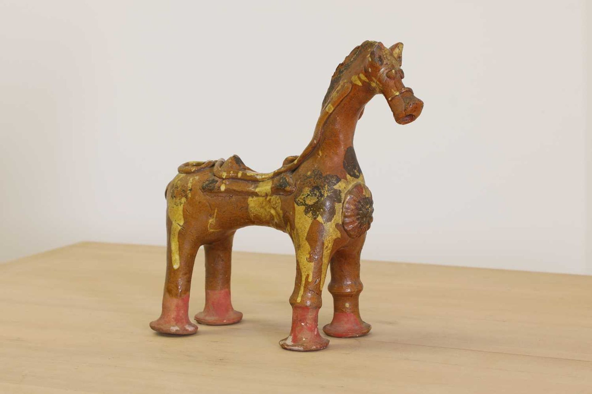 A Turkish pottery aquamanile in the form of a horse,