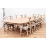 A large limed oak dining table,