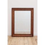 A large stripped beech mirror,