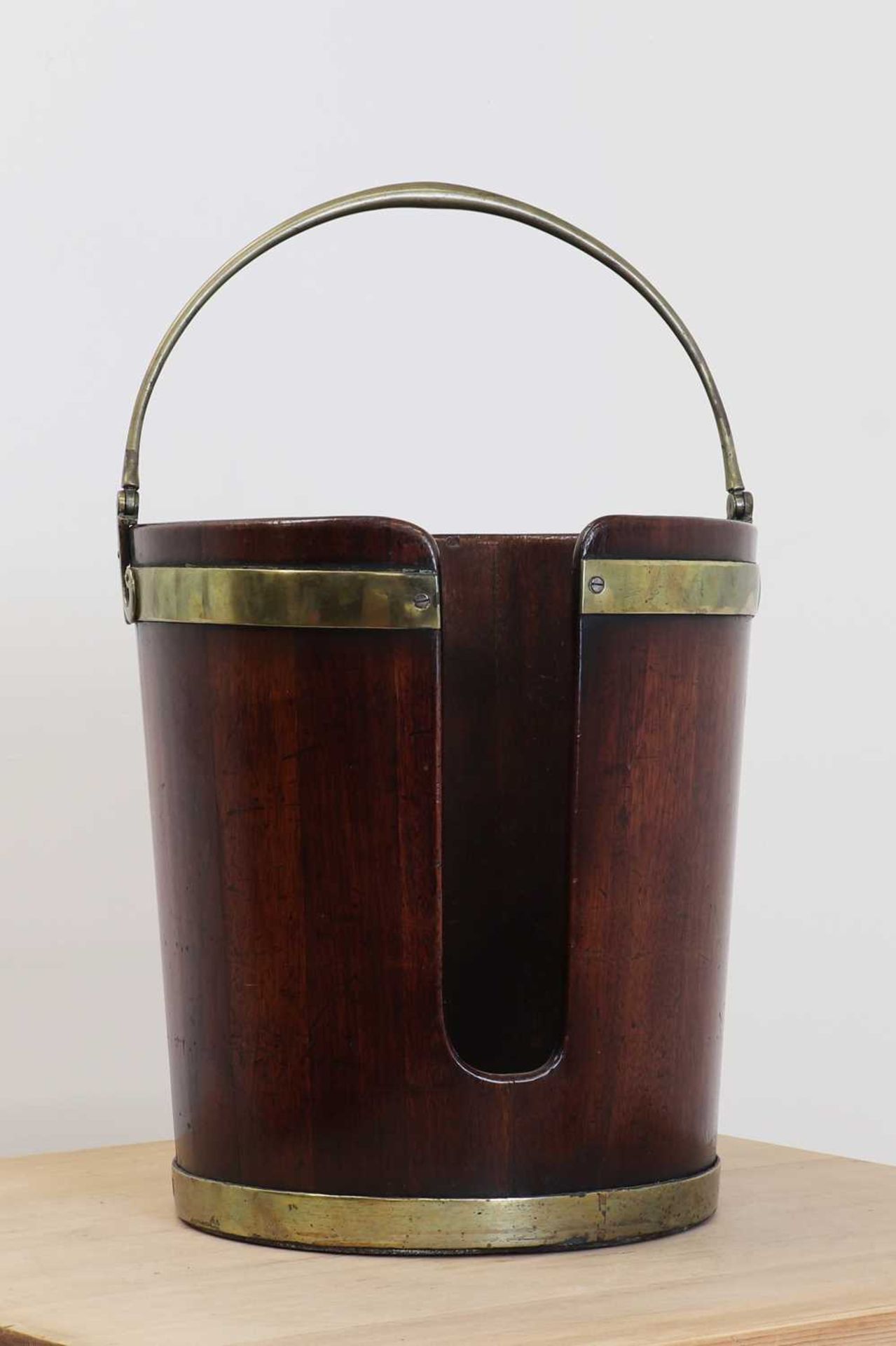 A George III mahogany plate bucket,