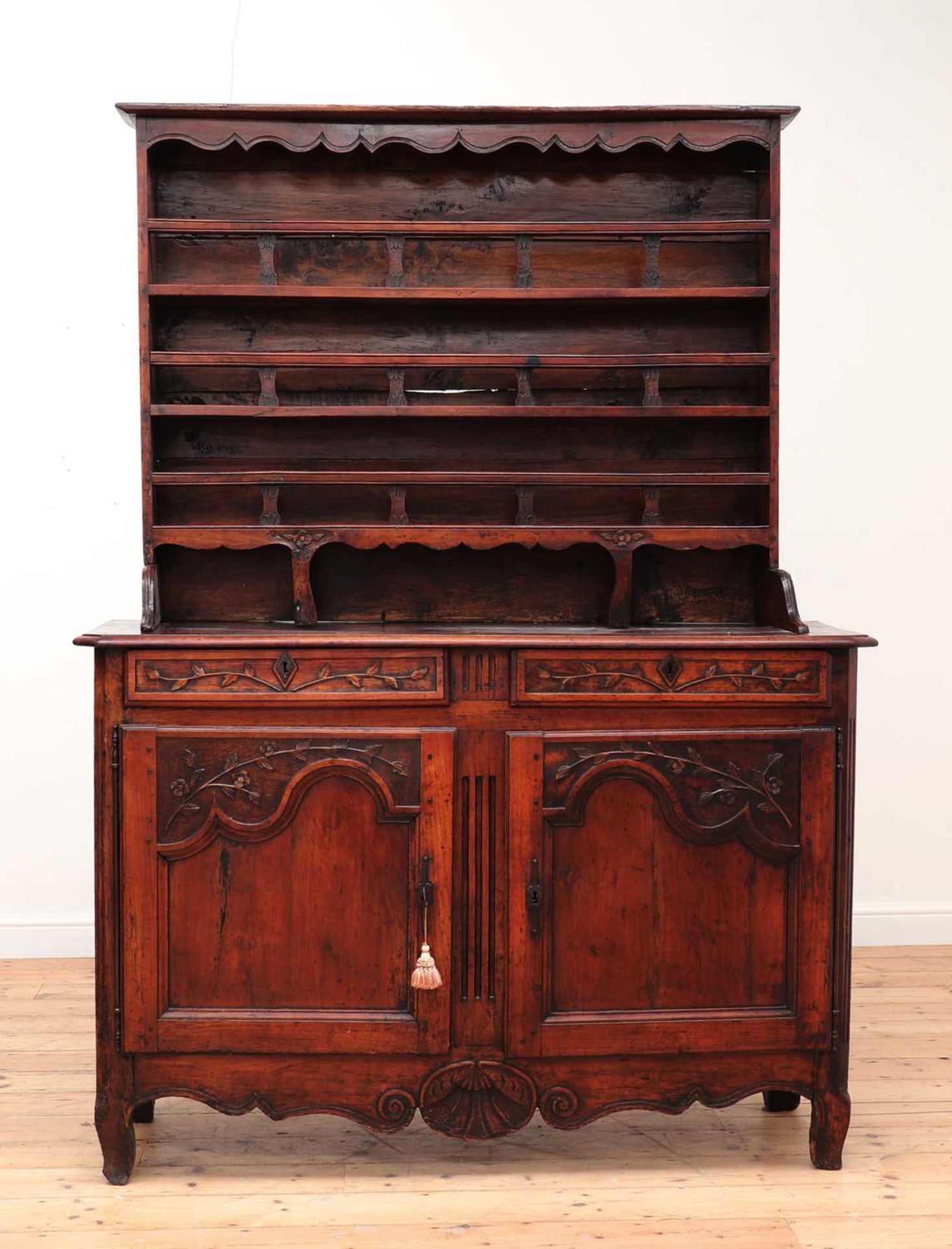 A carved chestnut dresser,