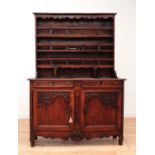 A carved chestnut dresser,