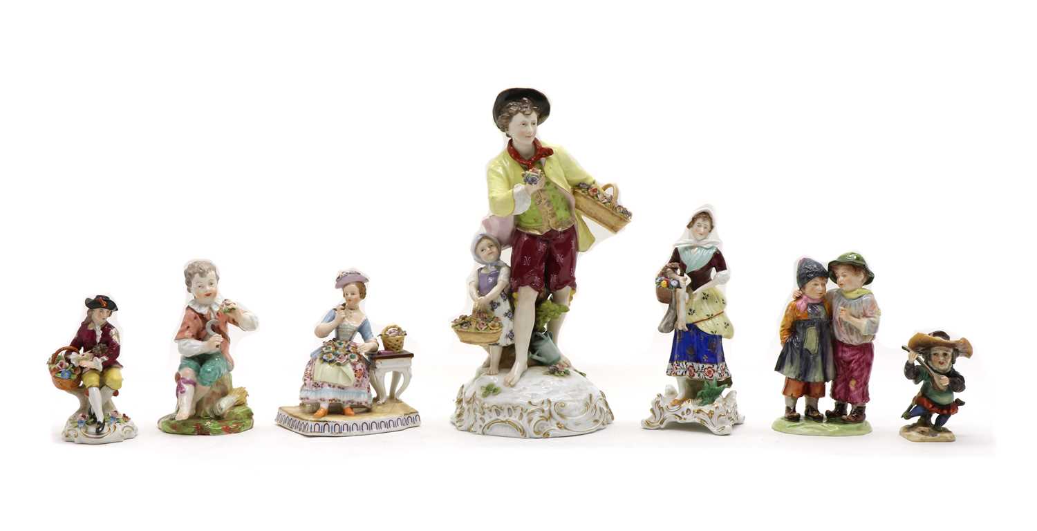 A collection of twelve Continental porcelain figures,