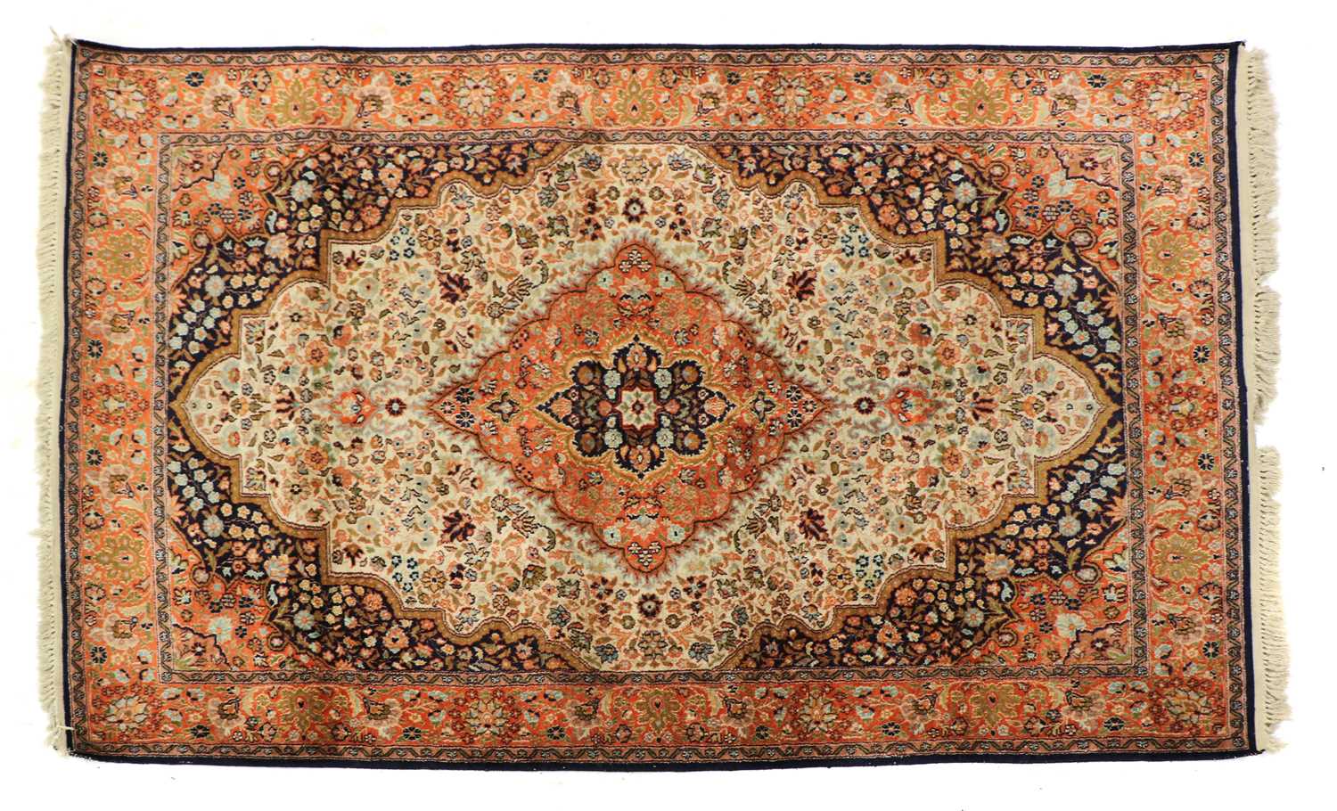 A silk rug of Persian design,