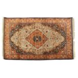 A silk rug of Persian design,