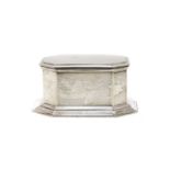 An octagonal silver box,