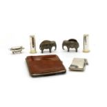A collection of silver novelty items,