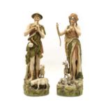 A pair of Royal Dux figures of a shepherd and shepherdess