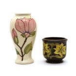 A Moorcroft pottery ‘Magnolia’ pattern vase,